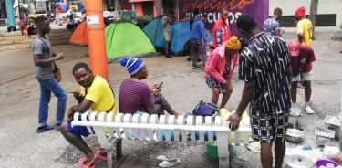 Migrantes haitianos en la Plaza Giordano Bruno