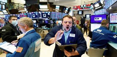 Wall Street abre en rojo pese a estímulos de Fed