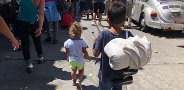 Niñas y niños en riesgo en caravana de migrantes hondureños