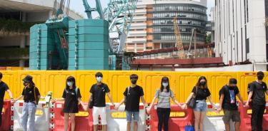 Estudiantes forman cadenas humanas prodemocracia en Hong Kong