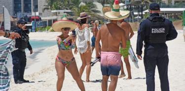 Turistas en en Playa del Carmen
