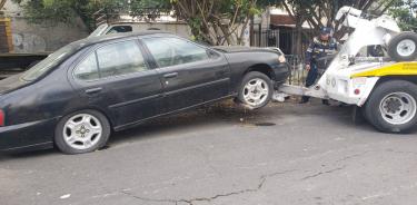 Carros chatarra en Azcapotzalco