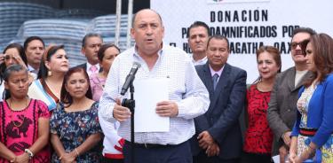 Rubén Moreira Valdez, coordinador de l PRI en la Cámara de Diputados, durante su mensaje en favor de damnificados de Oaxaca.