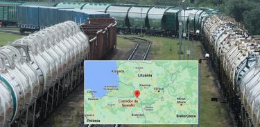 Trenes de mercancías, estacionados en Kybartai, entre el enclave ruso de Kaliningrado y Lituania, el martes 21 de junio de 2022. En el mapa, el corredor de Suwałki, la frontera entre Lituania y Polonia.