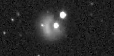 Vista desde un telescopio en Haewai de la nube de materia sale despedida del sistema Didymos tras el impacto de la nave DART.