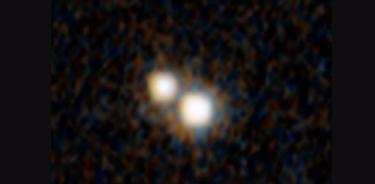 Una foto del Hubble de un par de cuásares que existían cuando el universo tenía apenas 3.000 millones de años.
