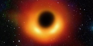 Astrónomos han detectado un agujero negro supermasivo extremadamente rojo en el universo primitivo que crece en las sombras.