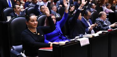 Legisladores de la Comisión de Puntos Constitucionales durante la aprobación de reformas sl artículo 123 de la Carta magna.