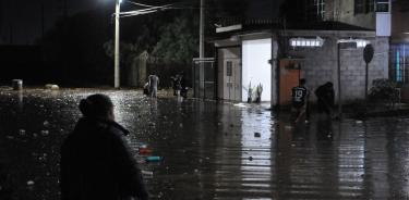 De día o de noche, la pesadilla que viven los más de 7,000 damnificados en Chalco con sus casas inundadas por aguas negras es una realidad/CUARTOSCURO/