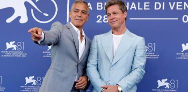 Los actores Brad Pitt y George Clooney en la Mostra de Venecia.