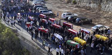 Funerales de víctimas por los taques israelíes el 25 de septiembre, en la aldea de Maaysra